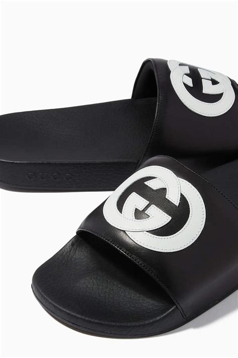 gucci slides men's black|men gucci interlocking slides.